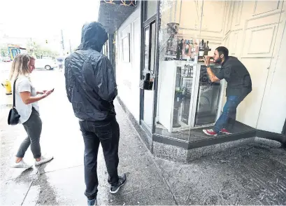  ?? RICHARD LAUTENS/TORONTO STAR ?? The Coffee Lab is an example of how Toronto is under pressure to use every bit of available space, Christophe­r Hume writes.