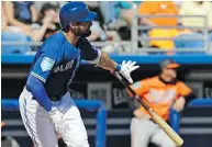  ?? CHRIS O’MEARA / THE ASSOCIATED PRESS ?? Kevin Pillar of the Blue Jays says being 15 pounds lighter has benefitted him at the plate this spring training.