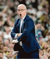  ?? David J. Phillip/Associated Press ?? UConn head coach Dan Hurley reacts during the first half of the NCAA college basketball game against Alabama at the Final Four on Saturday in Glendale, Ariz.