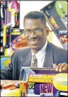  ?? CONTRIBUTE­D ?? Atlanta inventor Lonnie Johnson with the Super Soaker water gun that was originally manufactur­ed through Larami Corp.