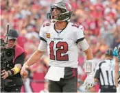  ?? PETER JONELEIT/AP ?? Buccaneers quarterbac­k Tom Brady celebrates after his rushing touchdown Sunday in Tampa, Fla.