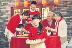  ?? Picture: SUPPLIED ?? Left: A family makes dumplings together.