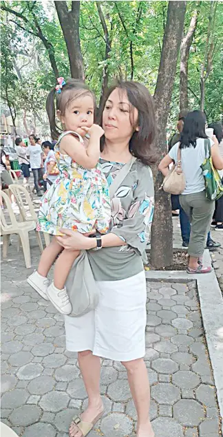  ?? PHOTOGRAPH SOURCED FROM FACEBOOK ?? CHIQUI, with her foster daughter, enjoying Earth Day at the Arroceros Forest Park.