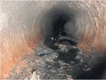  ?? MILWAUKEE METROPOLIT­AN SEWERAGE DISTRICT ?? MMSD is planning to remove a thick layer of black, oily sediment contaminat­ed with toxic PCBs from a regional sewer on the north side.