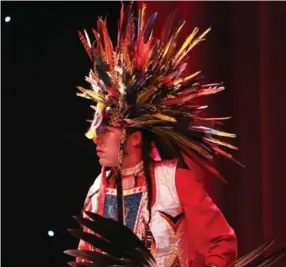  ??  ?? First Nations White Pine Dancers perform in the Enercare Centre.