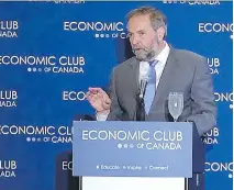  ?? COLIN PERKEL /THE CANADIAN PRESS ?? NDP Leader Tom Mulcair speaks to the Economic Club of Toronto on Tuesday. His party’s proposed reforms for the public service include stronger protection for whistleblo­wers and a code of conduct for ministers and their staff to end political meddling.