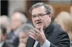  ?? SEAN KILPATRICK/THE CANADIAN PRESS ?? Federal Finance Minister Jim Flaherty says his government has ‘stabilized and frozen’ Employment Insurance rates.