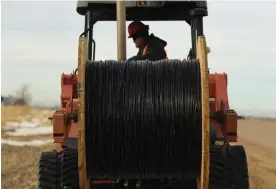  ?? Post/Denver Post/Getty Images RJ Sangosti/MediaNews Group/The Denver ?? Commercial broadband services have often been reluctant to lay fiber optic cable in rural areas, seeing it as unprofitab­le. Photograph: