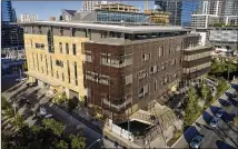  ?? JAY JANNER / AMERICAN-STATESMAN ?? Austin’s innovative­ly designed new library expresses everything good about the city, a reader writes.