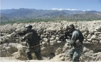  ?? Noorullah Shirzada / AFP / Getty Images ?? Afghan troops take part in an operation against Islamic State militants in Nangarhar province a day after the U.S. military struck the area with its largest nonnuclear bomb.