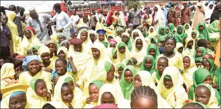 ??  ?? Some of the beneficiar­ies of the free school uniforms and bags donated by Governor Muhammadu Yahaya of Gombe State to pupils in public schools and girl-child learning centres in the state