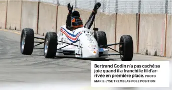  ?? PHOTO MARIE-LYSE TREMBLAY-POLE POSITION ?? Bertrand Godin n’a pas caché sa joie quand il a franchi le fil d’arrivée en première place.