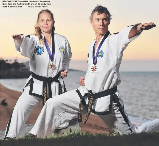  ?? GRADING TEST: Townsville taekwondo instructor­s Nigel Paul and Andrea Smith are off to study their craft in South Korea. Picture: WESLEY MONTS ??