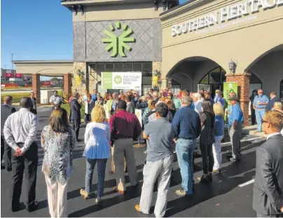  ?? STAFF PHOTO BY DAVE FLESSNER ?? Jeff Agee addresses business leaders and customers at the grand opening of the newest branch of Southern Heritage Bank.