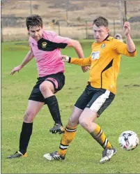  ?? Photo: Abrightsid­e Photograph­y. ?? John Treasurer battles for the ball.