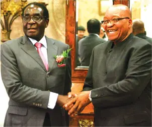  ??  ?? President Mugabe and his South African counterpar­t President Jacob Zuma have expressed their unequivoca­l commitment to the One-Stop Border Post