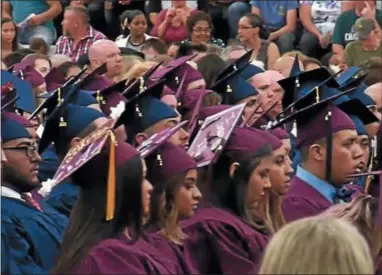  ?? SUBMITTED PHOTO ?? Graduating seniors listen to Lauren McNair (Early Childhood Care &amp; Education) deliver her senior reflection at the TCHS Pennock’s Bridge Campus graduation.