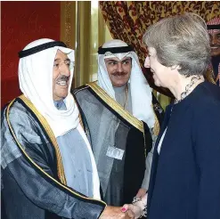  ?? —AFP/KUNA ?? MANAMA: Gulf Cooperatio­n Council (GCC) leaders pose for a group picture during a GCC summit in the Bahraini capital yesterday. (Right) HH the Amir of Kuwait Sheikh Sabah Al-Ahmad Al-Jaber Al-Sabah meets British Prime Minister Theresa May yesterday.