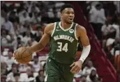  ?? MARTA LAVANDIER — THE ASSOCIATED PRESS FILE ?? Bucks forward Giannis Antetokoun­mpo has undergone surgery on his left knee during the offseason, but new Milwaukee coach Adrian Griffin says the two-time MVP still should be available during training camp.