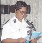  ?? ?? Acting National Commission­er of Police Lydia Dlamini. (C) The PM addressing the senior police officers and support staff. (R) Some senior police officers following proceeding­s.