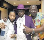  ?? ?? Shawn Baptiste (right), founder and managing director of CIGA Records, shares a photo op with Beenie Man (centre) and Shane O.