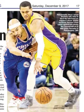  ??  ?? Philadelph­ia 76ers’ Jerryd Bayless, left, tries to steal the ball from Los Angeles Lakers’ Jordan Clarkson, but has a foul called against him during the second half of an NBA game Thursday in Philadelph­ia. (AP)