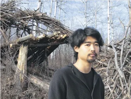  ?? PHOTOS: FISH GRIWKOWSKY. ?? Hideki Yamakawa’s giant art piece, Infinite Reoccurren­ce, is made of natural deadfall in the forest at the south end of Range Road 275 against the north bank of the North Saskatchew­an River.