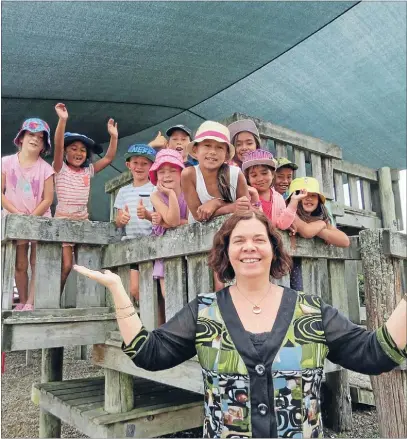  ??  ?? Kiwi welcome: Whakamaru School’s new principal Joanne Burch is welcomed by the eager students.