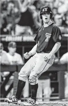  ?? Nati Harnik / Associated Press ?? Texas Tech's Cody Farhat is excited after scoring on a two-run single by Gabe Holt in the fifth inning Sunday night.