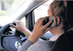  ??  ?? In March, the punishment for driving while on the phone was doubled to six penalty points