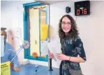  ?? EDDIE MOORE/JOURNAL ?? Luna Burd of Albuquerqu­e receives her new birth certificat­e with her gender changed at the vital records office of the New Mexico Department of Health in Santa Fe on Tuesday.