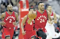  ?? ROB CARR/GETTY IMAGES ?? Toronto Raptors’ forward Norman Powell dribbles the ball against the Washington Wizards in the first half at Verizon Center last season.