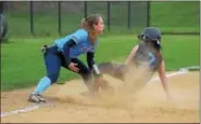  ?? GENE WALSH — DIGITAL FIRST MEDIA ?? CB South’s Alexa Ortman advances to third as North Penn’s Victoria Juckniewit­z puts on the tag Monday.