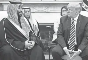  ?? AFP/GETTY IMAGES ?? President Trump and Crown Prince Mohammed bin Salman in the Oval Office in March. A Khashoggi report is due as early as today.