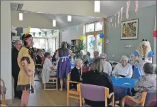  ?? 01_B25sandpip­er01 ?? Staff of Montrose House dressed as Disney characters for the coffee afternoon.