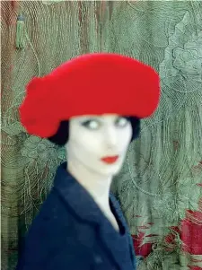  ??  ?? Punto di rosso Fotografat­a da Norman Parkinson, Adele Collins indossa un toque in velluto di Otto Lucas. Vogue, novembre 1959 (Iconic Images)