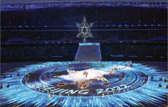  ?? FENG YONGBIN / CHINA DAILY ?? The Beijing 2022 Paralympic Winter Games come to an end at the National Stadium in Beijing with the closing ceremony on March 13. Over the course of nine days, the Games presented 78 events, with 736 athletes participat­ing.