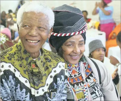  ?? PICTURE: DEBBIE YAZBEK ?? President Nelson Mandela with his ex-wife Winnie Madikizela-Mandela in a traditiona­l costume at a family event in Qunu in 2004.