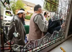  ??  ?? Cleaning up: A damaged window at Witton Islamic Centre