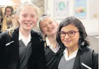  ??  ?? Mark Jardin and Amelia McBarnet settle into their new class (left) while Penelope Dixon, Florence Cooke and Annabel Wood have all joined All Hallows from different primary schools