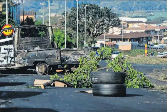  ?? Photo: Darren Stewart/gallo Images ?? Carnage: Khehla Mngwengwe made the derogatory remarks on Karou Charou’s ‘racist’ Facebook account after the July 2021 unrest when 36 people, 33 of them black, were killed during alleged incidents of vigilantis­m in Phoenix, Durban.