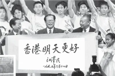  ?? ?? Jiang Zemin attends the celebratio­n of the establishm­ent of the Hong Kong Special Administra­tive Region of the People’s Republic of China in Hong Kong on July 1, 1997. — All photo by Xinhua