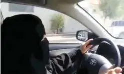  ??  ?? RIYADH: File photo shows a fully veiled woman driving in Riyadh ahead of a thenplanne­d nationwide day of defiance of the ban on women driving. — AFP