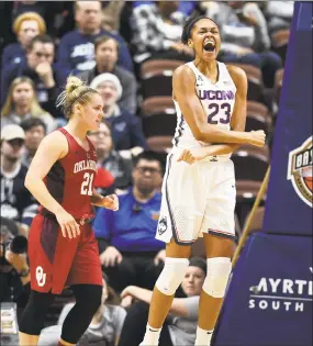  ?? Jessica Hill / Associated Press ?? Azura Stevens reacts after scoring a basket while getting fouled Tuesday night.