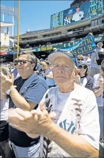  ?? D. Ross Cameron ?? HANDS TOGETHER: Bob Amerman, who coached Aaron Judge as a sophomore in high school, cheers on his former player Saturday against the Athletics.