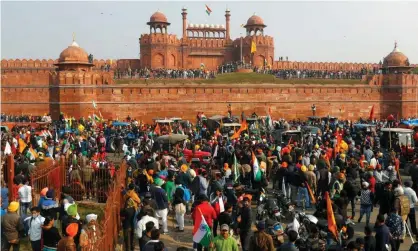  ??  ?? Farmers gather in front of the historic Red Fort during a protest against new farm laws. Photograph: Adnan Abidi/Reuters