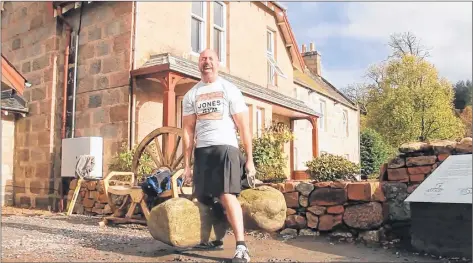  ??  ?? Keith Surette, owner of Jones Gym in Yarmouth, spent time in Scotland recently, pitting his strength against lifting stones of legend.