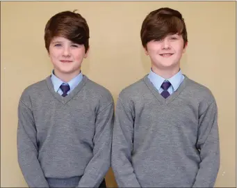  ?? Twins Conrad and Edwin Collins graduated from Kiskeam National School. Photo by Sheila Fitzgerald ??