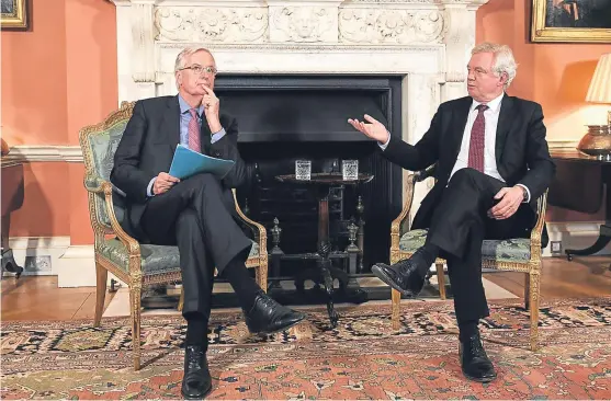  ?? Picture: PA. ?? European Union negotiator Michel Barnier, left, at 10 Downing Street for talks with Brexit Secretary David Davis.