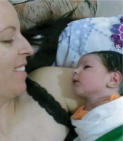  ??  ?? A mother’s love: Louth woman Lisa Smith and her baby Rakeya, who was born in Isis terrority
